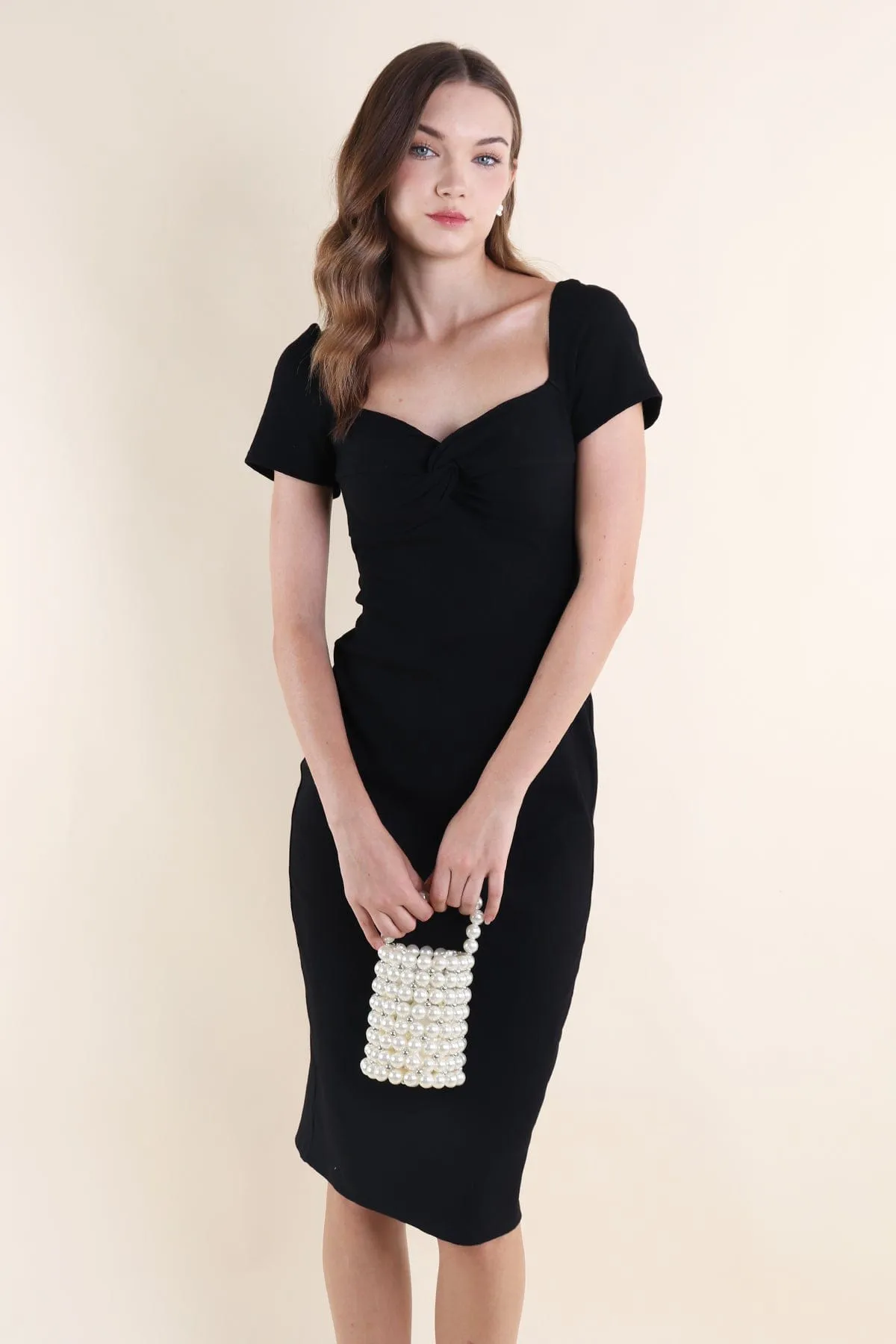 CINTRA KNOTTED RIBBED DRESS IN BLACK