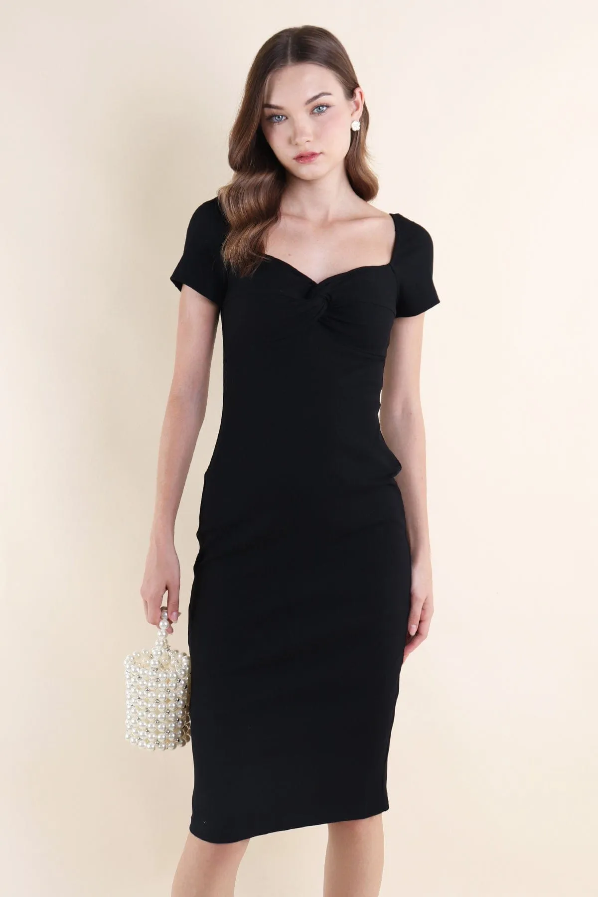 CINTRA KNOTTED RIBBED DRESS IN BLACK