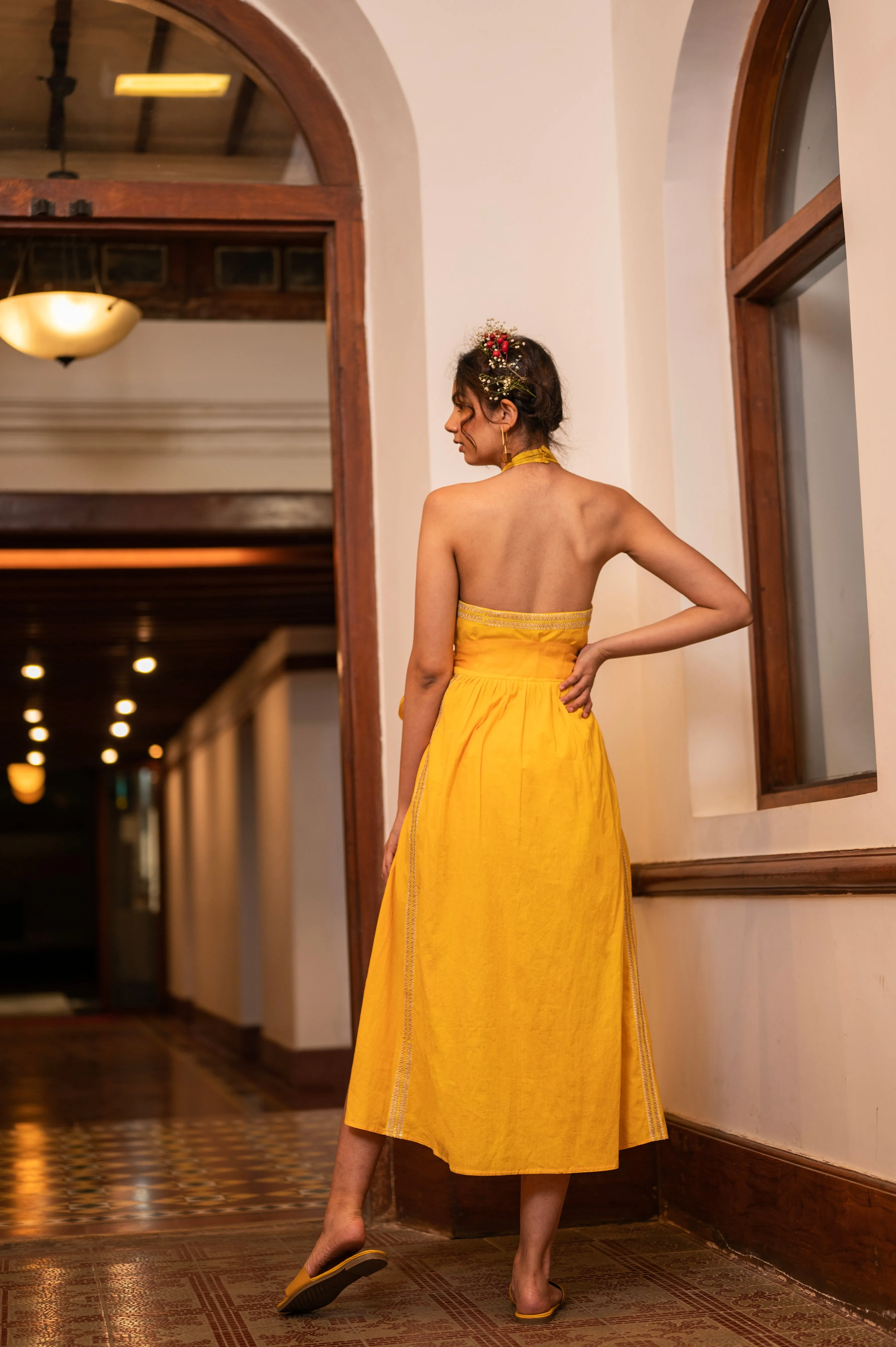 Cotton halter dress with hand embroidered sunflower motif